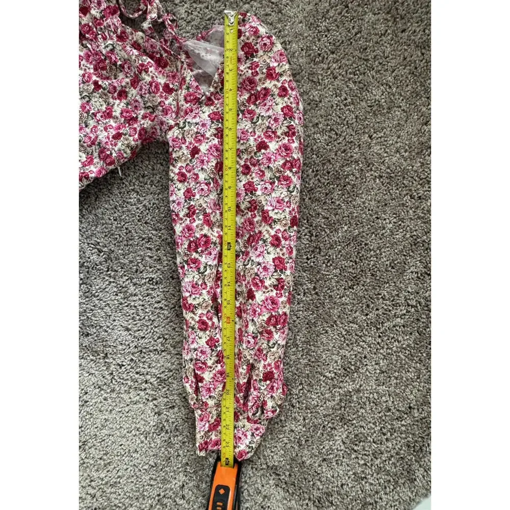 This beautiful Nasty Gal mini dress in size 4 features a vibrant floral print - Picture 6 of 12